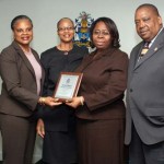 Florene Gilbert Named Employee of the Quarter at the Department of Immigration