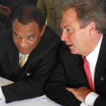Ginn in trouble as US economy worsens